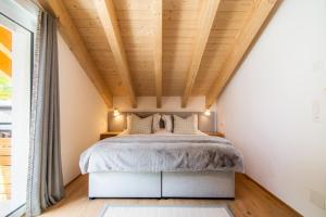 Postel nebo postele na pokoji v ubytování Britannia Penthouse + 7 fotografií
