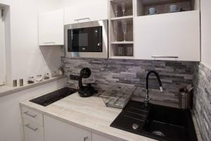 Kuchyň nebo kuchyňský kout v ubytování apartmány U Solišů