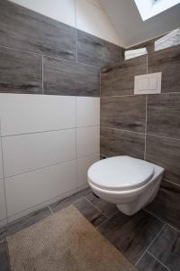 Koupelna v ubytování apartmány U Solišů