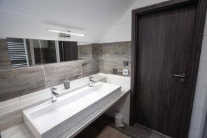 Koupelna v ubytování apartmány U Solišů