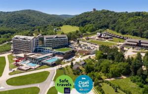 an aerial view of a hotel with a resort at Movenpick Resort and Spa Fruske Terme in Vrdnik