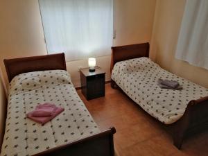Postel nebo postele na pokoji v ubytování CHALET MONTPRATS, SERRA