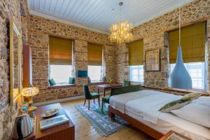 Postel nebo postele na pokoji v ubytování Delight Deluxe Hotel + 37 fotografií