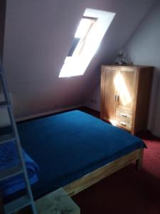 Postel nebo postele na pokoji v ubytování Ferienwohnung am Küstenwald