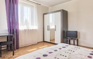 Posteľ alebo postele v izbe v ubytovaní Pensjonacik Zacisze