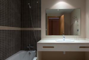Koupelna v ubytování Hotel Bulevard