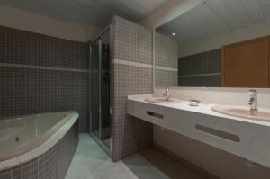 Koupelna v ubytování Hotel Bulevard