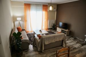 Televízia a/alebo spoločenská miestnosť v ubytovaní DreamHouse 2 - Komotini