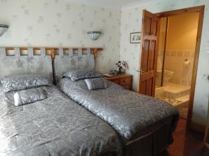 Vuode tai vuoteita majoituspaikassa Hollingworth Lake Guest House Room Only Accommodation