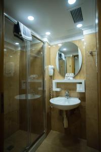 Koupelna v ubytování Byzantino Hotel
