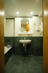 Koupelna v ubytování Byzantino Hotel