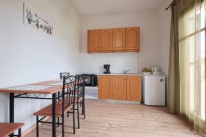 Η κουζίνα ή μικρή κουζίνα στο Olive Garden Studios & Apartments