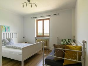 Ferienwohnung Landurlaub tesisinde bir odada yatak veya yataklar