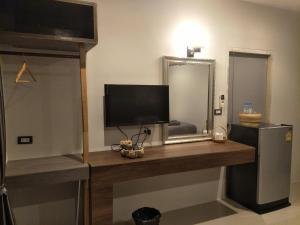 Kuchyň nebo kuchyňský kout v ubytování Suwi Coco Ville Resort