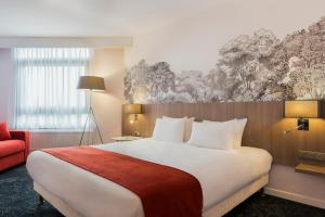 Postel nebo postele na pokoji v ubytování Holiday Inn Calais Coquelles by IHG