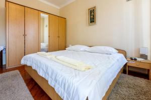 Postel nebo postele na pokoji v ubytování Rooms CICO