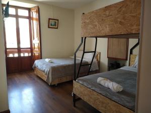 Katil atau katil-katil dalam bilik di Casona Hotel