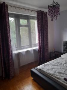 Posteľ alebo postele v izbe v ubytovaní Pensjonacik Zacisze
