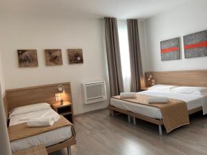 Posteľ alebo postele v izbe v ubytovaní Locanda Damaro