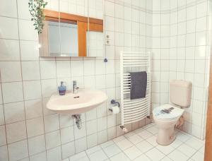 Koupelna v ubytování Auberge Leipzig + 33 fotografií