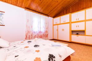 A bed or beds in a room at Holiday Home Villa Esperanca