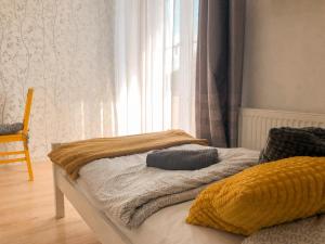 
Łóżko lub łóżka w pokoju w obiekcie Hostel Przed Świtem
