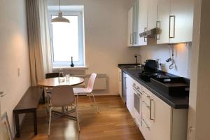 Кухня или кухненски бокс в Charmant Leben im Textilviertel - stilvolle Wohnung - zentral und ruhig