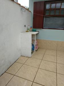 
A bathroom at APARTAMENTO SIMPLES E ACONCHEGANTE

