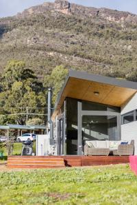 a large building with a train on top of it at Grampians Villas in Halls Gap