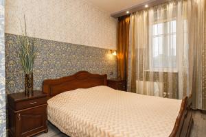Cama o camas de una habitación en Guest apartments Alesia