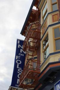 a building with a sign on the side of it at Inn on Folsom in San Francisco
