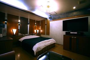 Postel nebo postele na pokoji v ubytování Hotel Ohirune Racco Higashiosaka ( Adult Only)