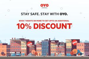 a poster with a city skyline with a discount at OYO Hotel McAllen Airport South in McAllen