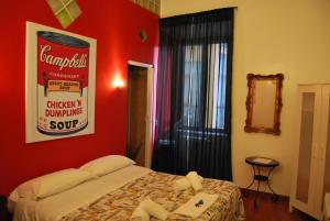 Cama o camas de una habitación en Core De Roma Suites