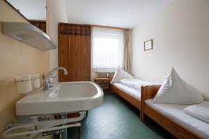 A bed or beds in a room at Ferienwohnung Heidi Még 5 kép