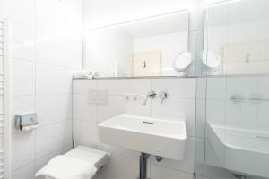 A bathroom at Ferienwohnung Heidi