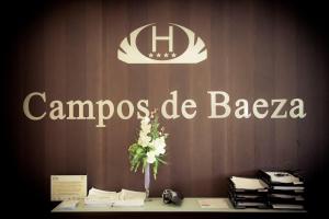 a sign that says campos de baga on a wall at Hotel Campos de Baeza in Baeza