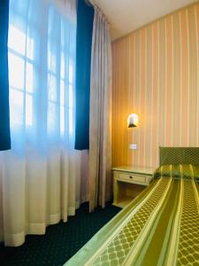 Foto sihtkohas Basiano asuva majutusasutuse Hotel Daniel galeriist