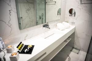 Kúpeľňa v ubytovaní Lagaria Hotel