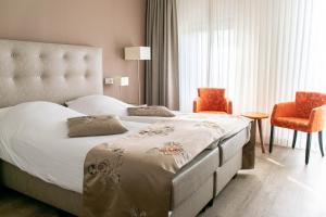 Katil atau katil-katil dalam bilik di Hotel Lemmer