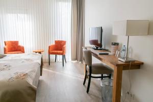 Katil atau katil-katil dalam bilik di Hotel Lemmer