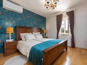 Postel nebo postele na pokoji v ubytování Villa Lucija by Interhome