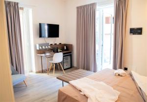Posteľ alebo postele v izbe v ubytovaní Tuscany Hotel Alle Dune
