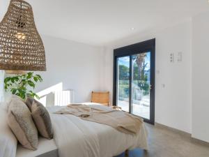 Posteľ alebo postele v izbe v ubytovaní Holiday Home Ca na Cati by Interhome