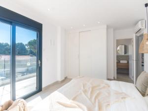 Posteľ alebo postele v izbe v ubytovaní Holiday Home Ca na Cati by Interhome