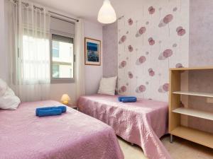Posteľ alebo postele v izbe v ubytovaní Apartment Fane de baix III by Interhome