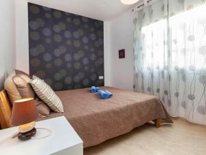 Posteľ alebo postele v izbe v ubytovaní Apartment Fane de baix III by Interhome