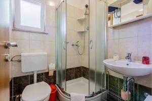 Kúpeľňa v ubytovaní Apartments Marissimo
