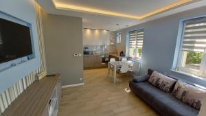 Kuchyňa alebo kuchynka v ubytovaní Apartament New Gdynia