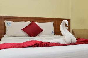 Postel nebo postele na pokoji v ubytování Hotel Sonas